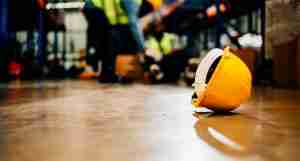 Warehouse staff having accident in the factory